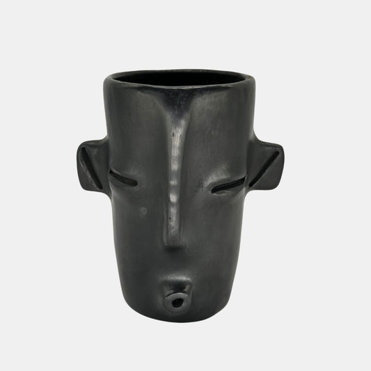 Face whistling with ears vase