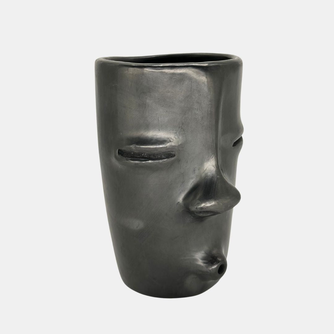 Face whistling vase